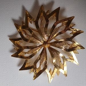 Monet floral faux gold brooch.